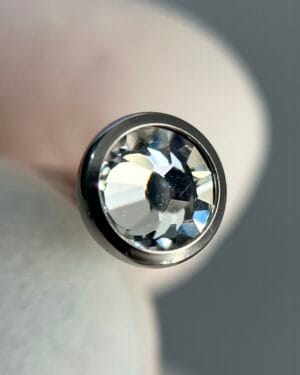 joya para piercing URD para oreja, nariz y boca en titanio